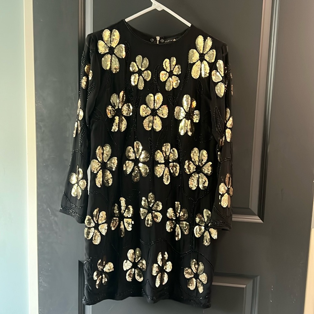 Black and gold beaded dress with high neck